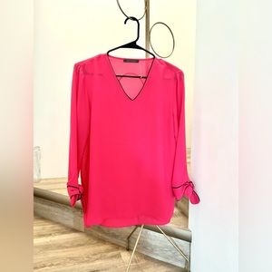 Pink dressy top size Med.